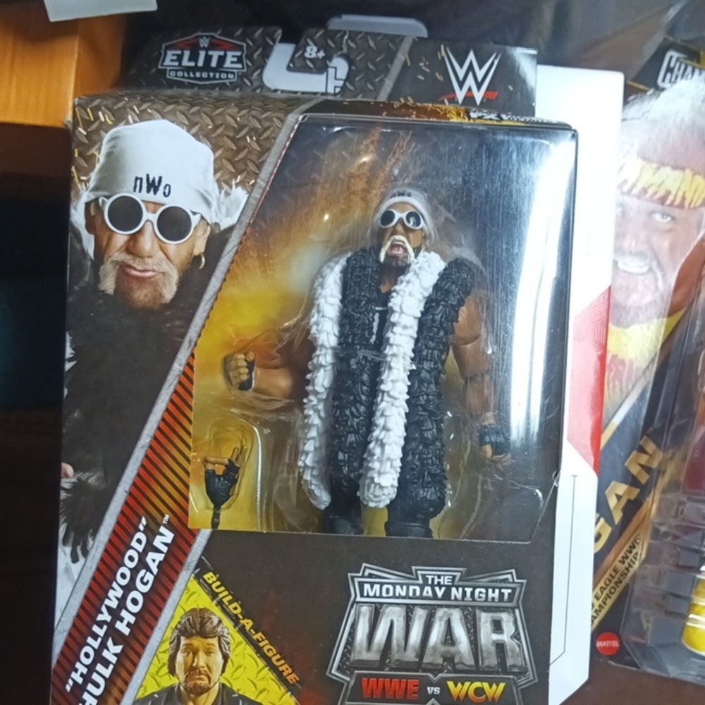 WWE Elite Hollywood Hulk Hogan Figure with Black and White Boa
